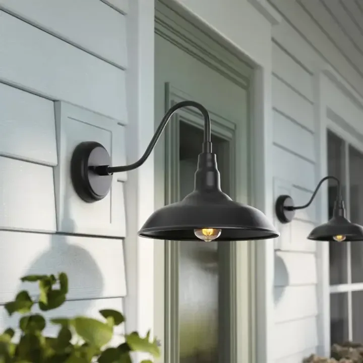 Barn light mounted above a garage door.