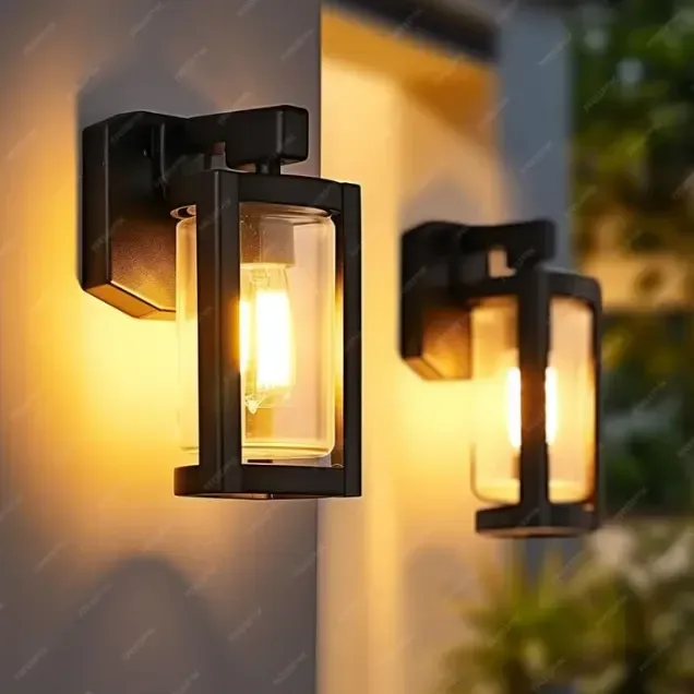 Outdoor wall lights flanking a front door.