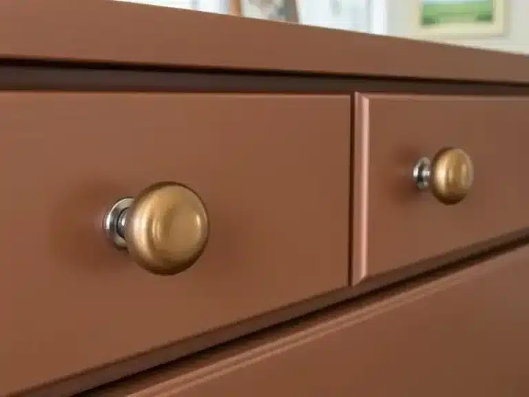 A dresser with new knobs and modern hardware for an updated look.