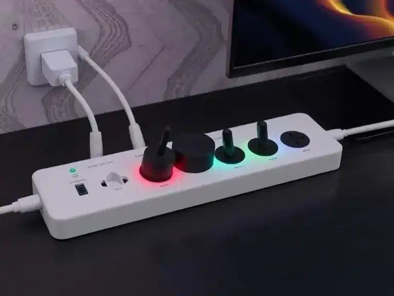 Smart power strip with multiple plugged-in devices, showing energy-saving functionality.